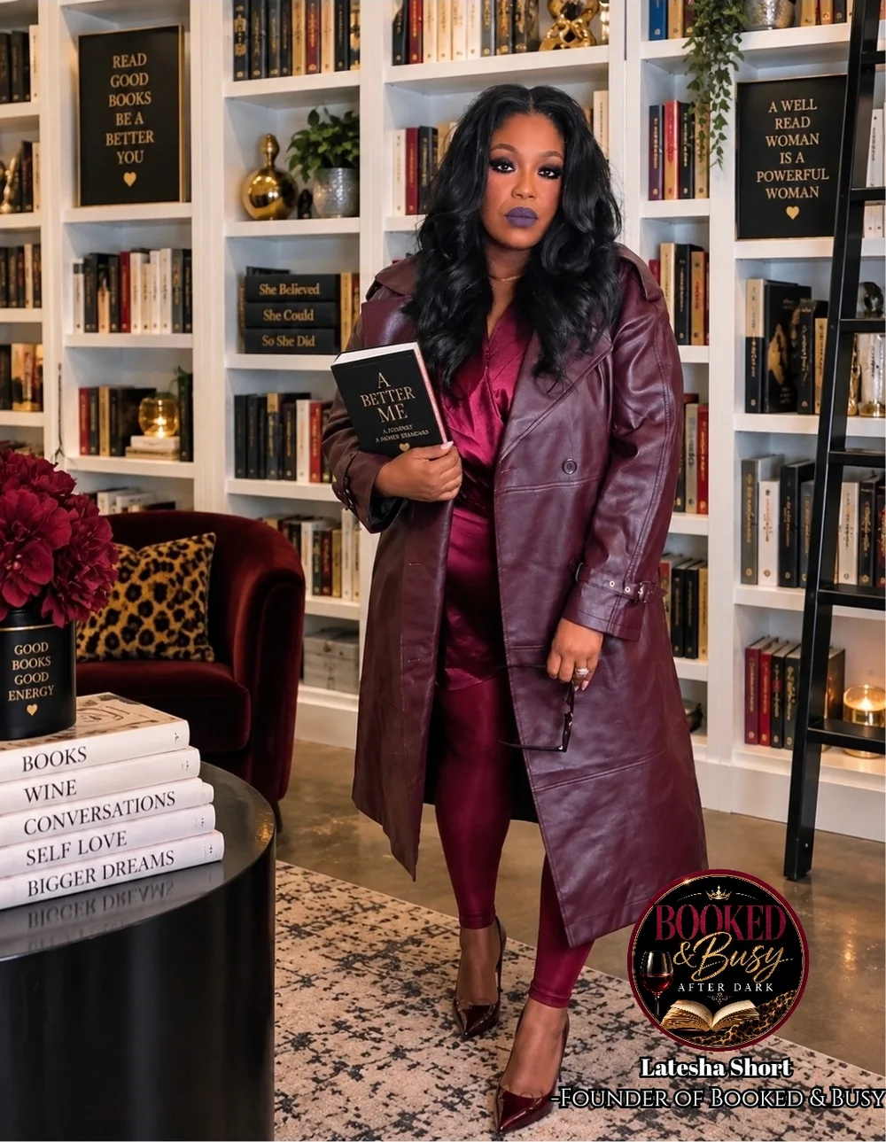 Latesha Short, founder of Booked & Busy After Dark, standing in front of a library and holding a book